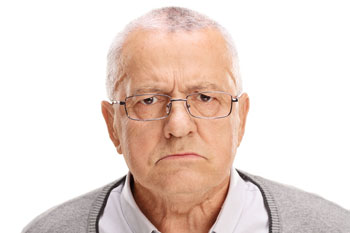 image of a grumpy older man