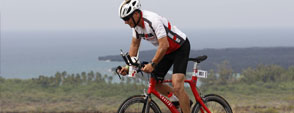 Victor Vusklans participating in the bicycling stage of the Ironman Championship 2013.